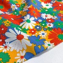 Vải thô cotton hoa xanh cam
