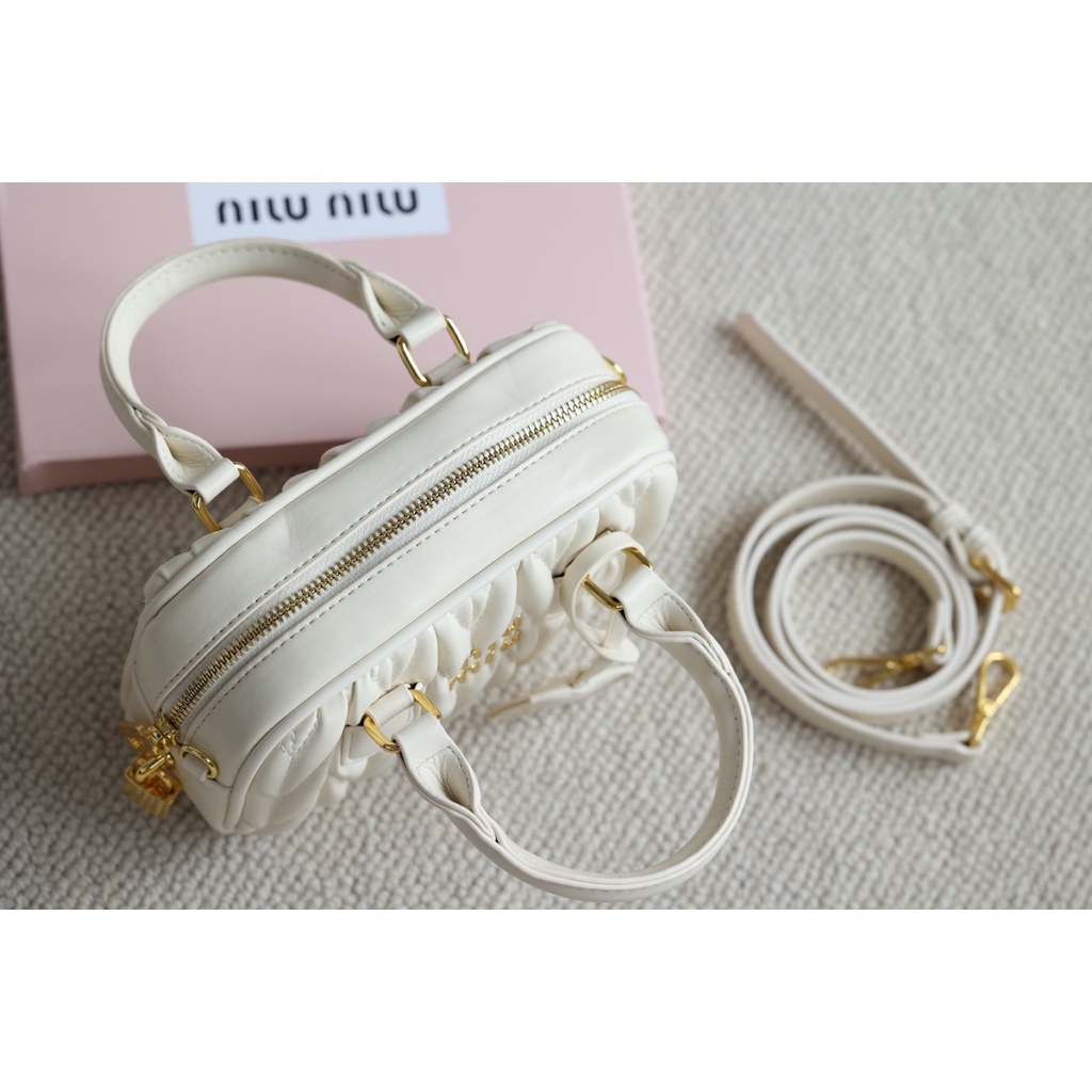 Túi cầm tay đeo chéo MIUMIU TRỐNG SZ21