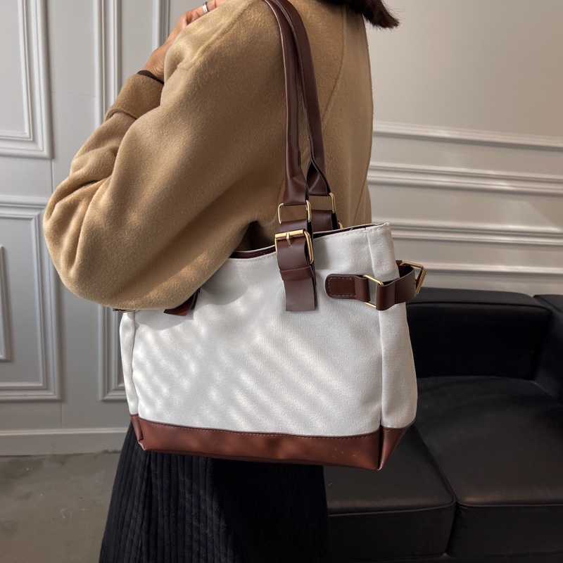 Túi xách đeo vai size trung vải canvas phối da mỏng