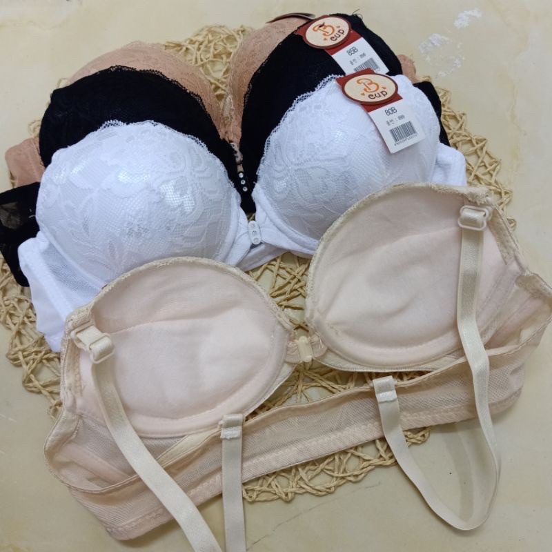 Áo cài khuy trước đệm nâng ôm ngực chống tụt. Gọng nhựa. Áo đi qua cửa từ. Chống báo động