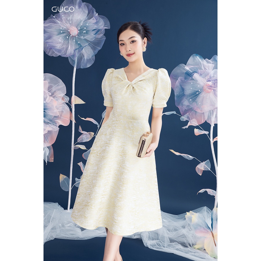 Đầm dáng xòe cổ nơ xoắn 3846 GUCO Vàng