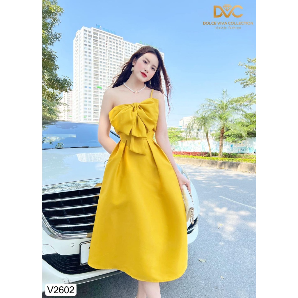 VÁY VÀNG XÒE LỆCH VAI NƠ NGỰC 2602 - DVC