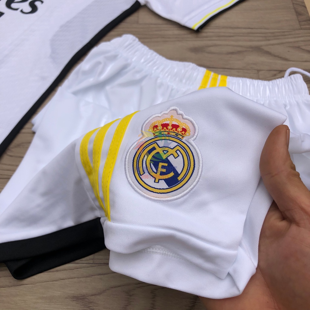 Bộ Quần Áo Bóng Đá Real Madrid 2024 Sân Nhà Màu Trắng Vải Gai Thái Có In Tên Số Theo Yêu Cầu
