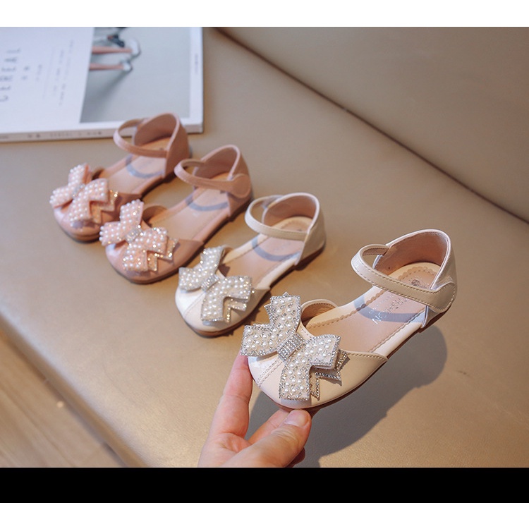 Sandal dép quai hậu bịt mũi trẻ em gắn nơ da mềm chống trượt cho bé gái từ 1 tuổi đến 9 tuổi (W50)Richkidsstore2021