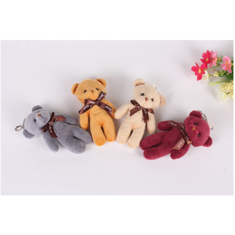 Gấu bông nơ màu hồng móc khóa size 10 -12 cm
