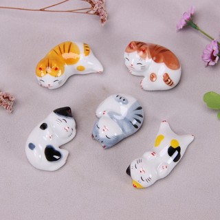 Gác cọ mèo sứ đáng yêu nhiều kiểu dáng