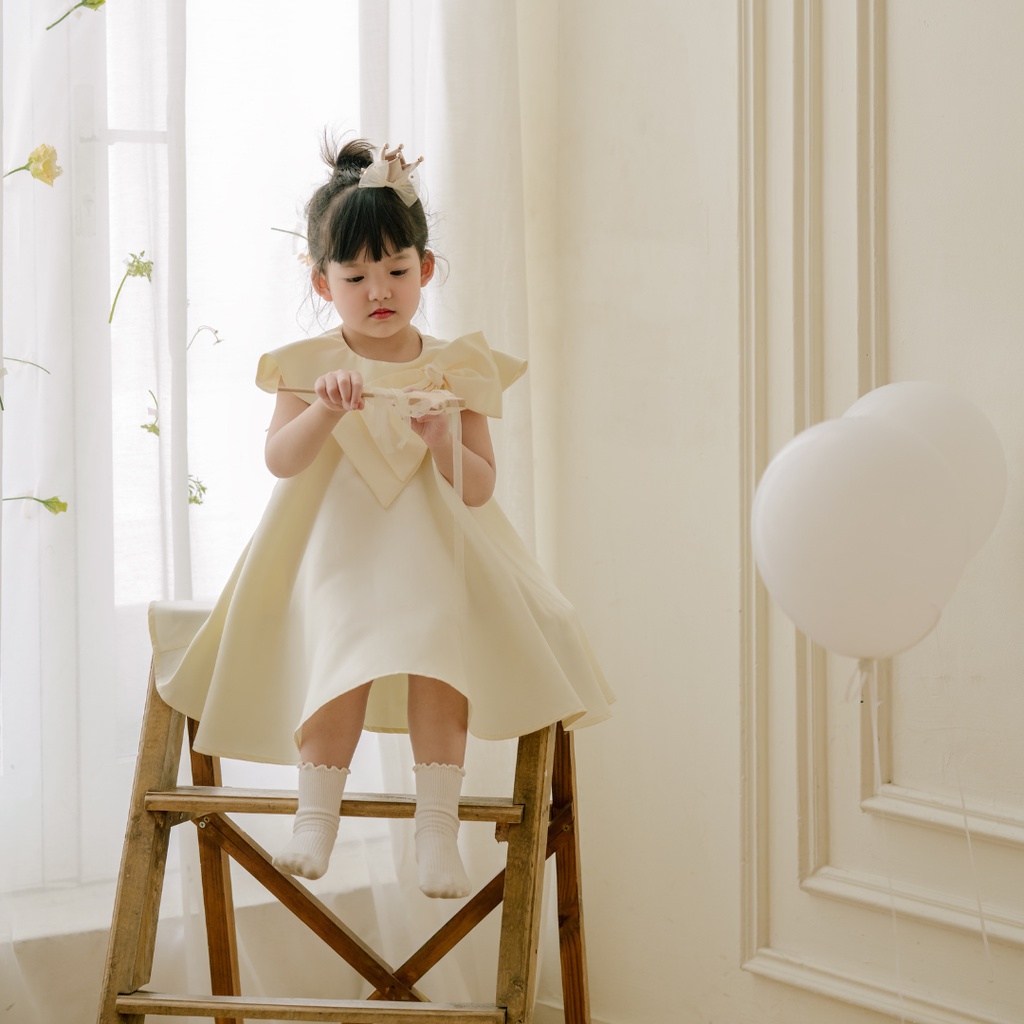 Váy xinh cho bé gái Sora.bébé Ivy Cream Dress chất liệu tafta cao cấp phối nơ bản to