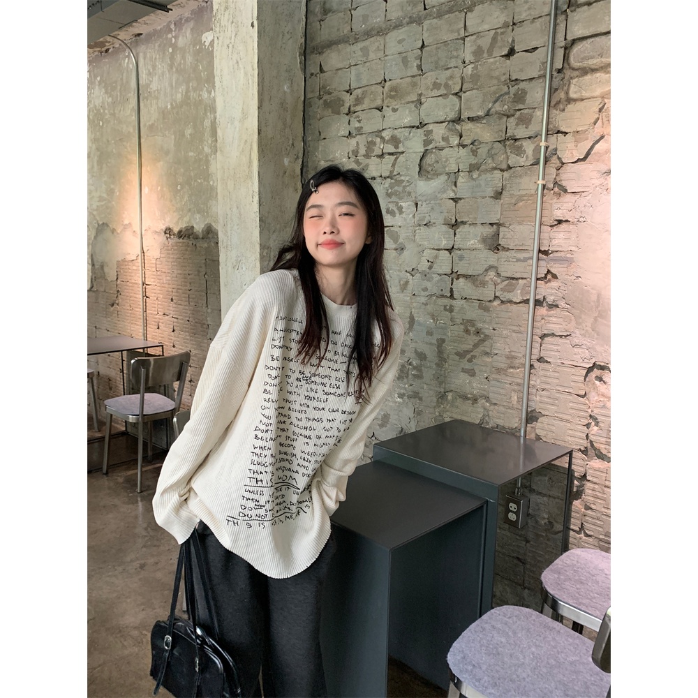 Áo thun nữ tay dài thun gân trắng in nhiều chữ đen áo form rộng/ áo ôm