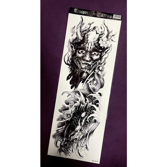 Hình xăm dán mặt quỷ cá chép đen full tay nửa lưng