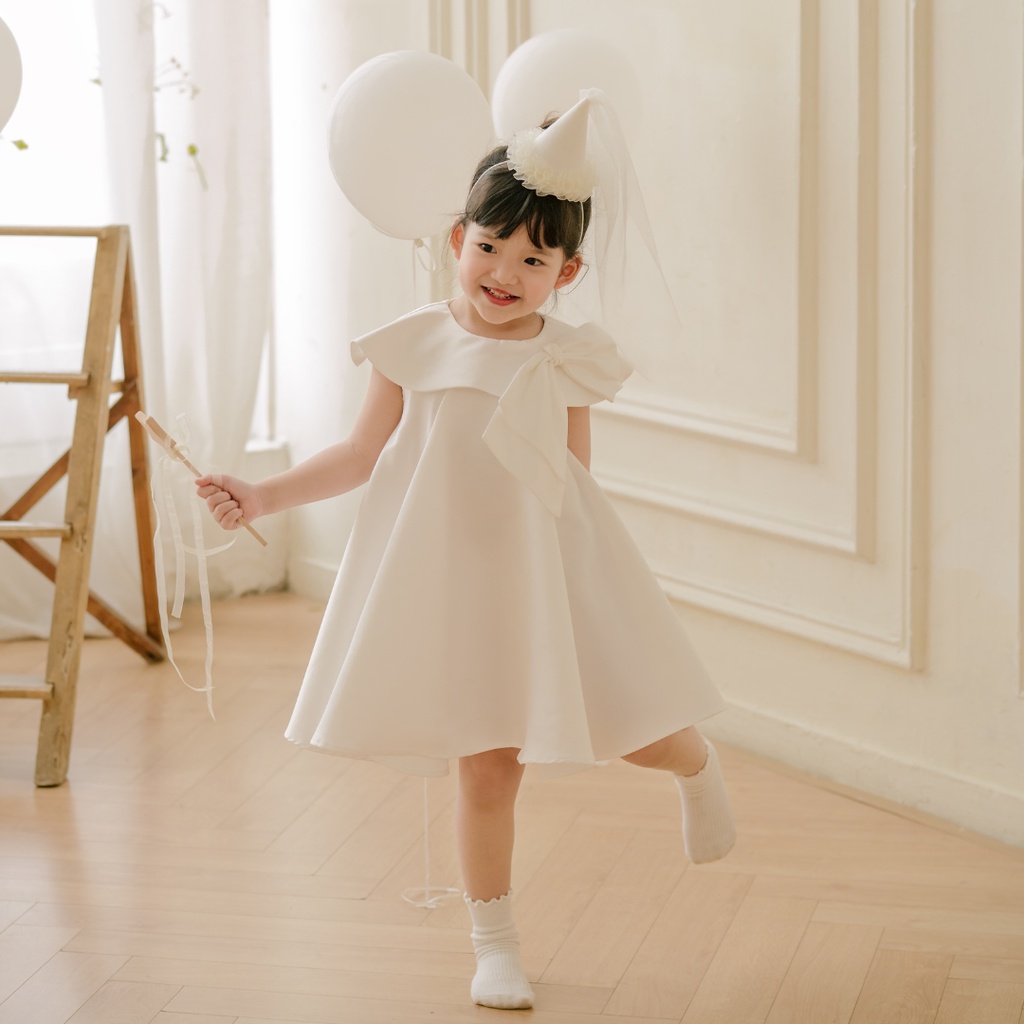 Váy xinh cho bé gái Sora.bébé Ivy Cream Dress chất liệu tafta cao cấp phối nơ bản to