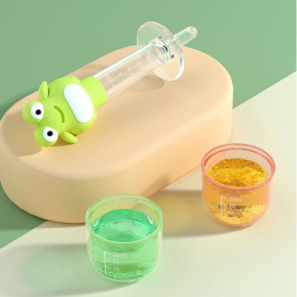Dụng cụ cho bé uống thuốc chống sặc hình ếch, có đầu silicon mềm Tặng kèm hộp đựng và cọ ống