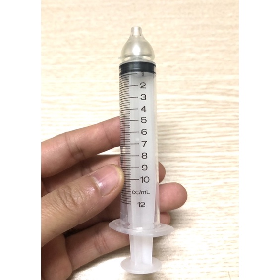 Dụng cụ rửa mũi bao gồm 1 đầu rửa và 1 bơm tiêm không kim Terumo cao cấp-Philippine