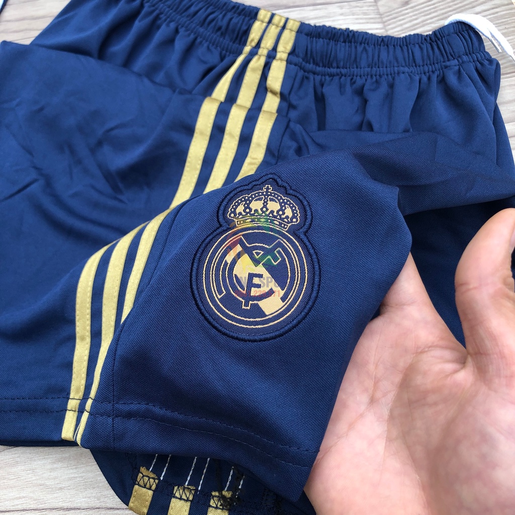 Bộ Quần Áo Bóng Đá Real Madrid Vân Rồng Vải Gai Thái Có In Tên Số Theo Yêu Cầu