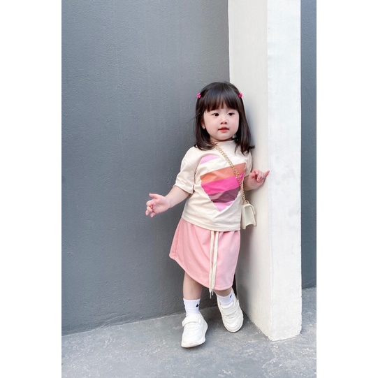 Set áo hình trái tim kèm quần váy Hồng cho bé