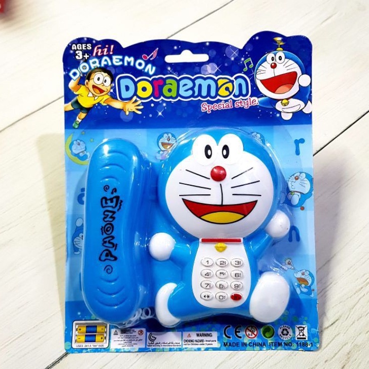 Đồ Chơi Điện Thoại Bàn Doraemon Dùng Pin Có Đèn Và Nhạc Vui Tai