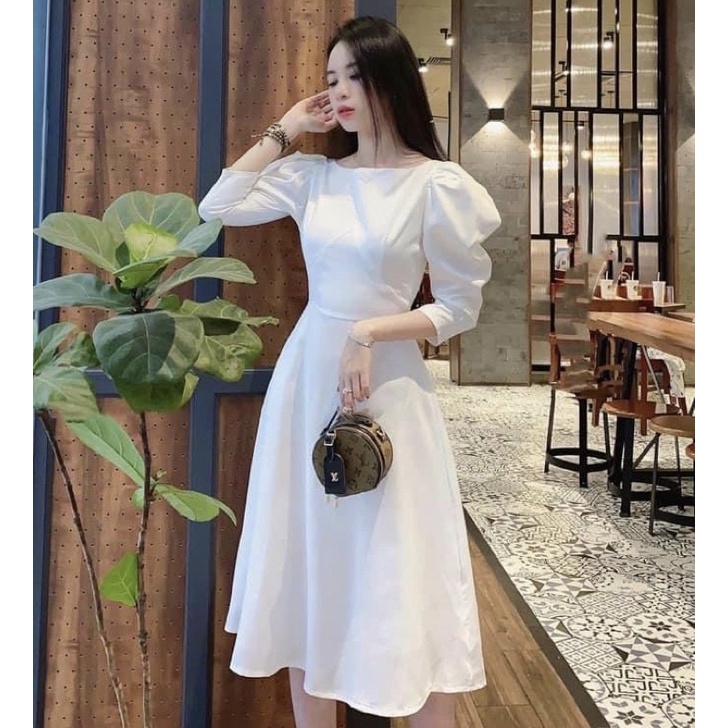 Đầm trắng cổ thuyền tay phồng