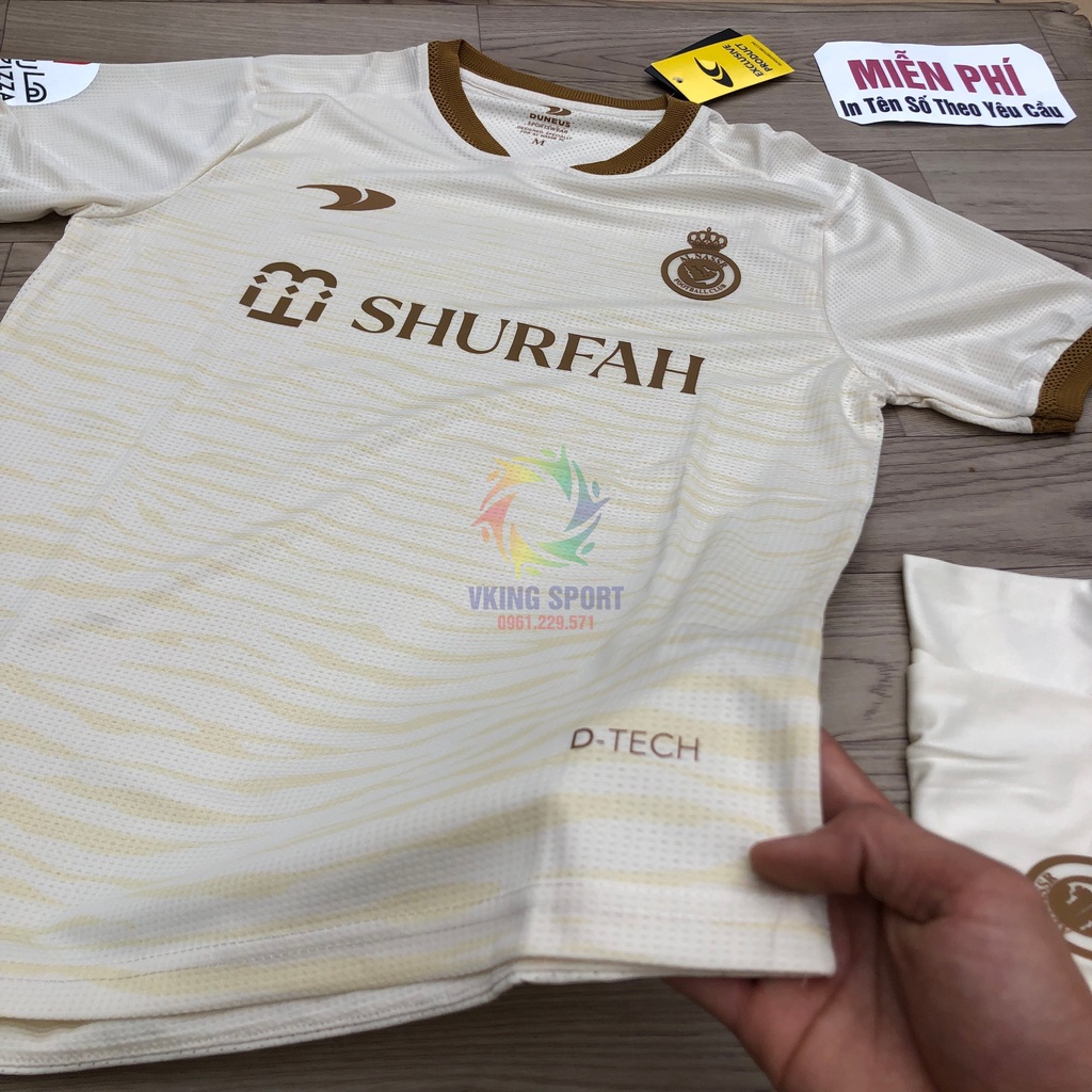 Bộ Quần Áo Bóng Đá AL Nassr 2023 Sân Khách Màu Kem Vải Thái Có In Tên Số Theo Yêu Cầu