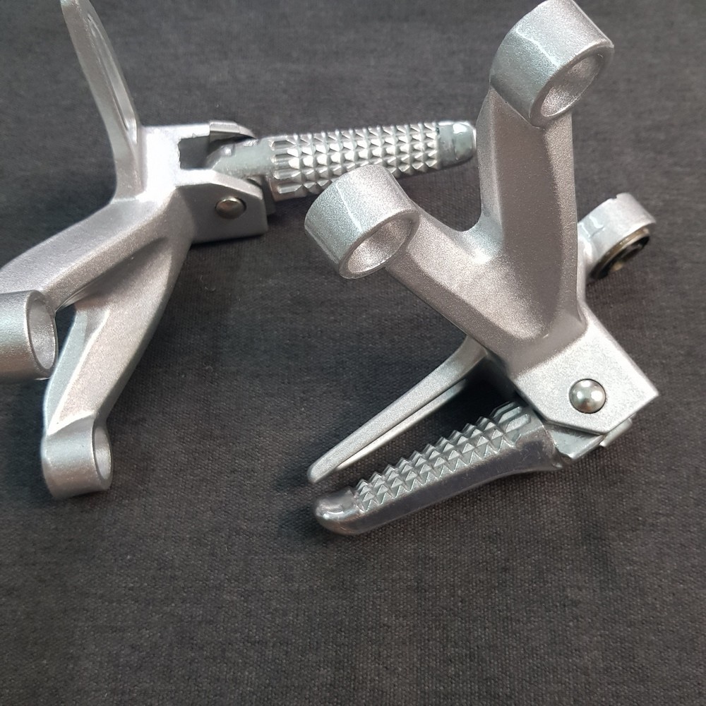 Gác Chân Sau Chất Liệu Nhôm Đúc Chắc Chắn Gắn Cho Raider, Xì Po