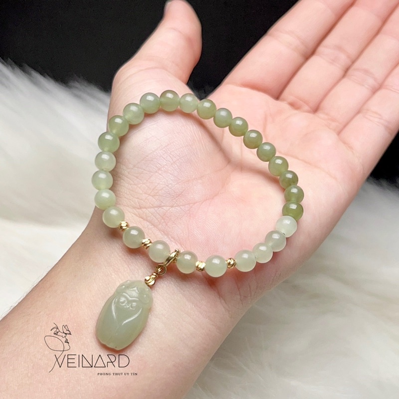 Vòng tay ngoc hoà điền hạt 6mm mix charm ve