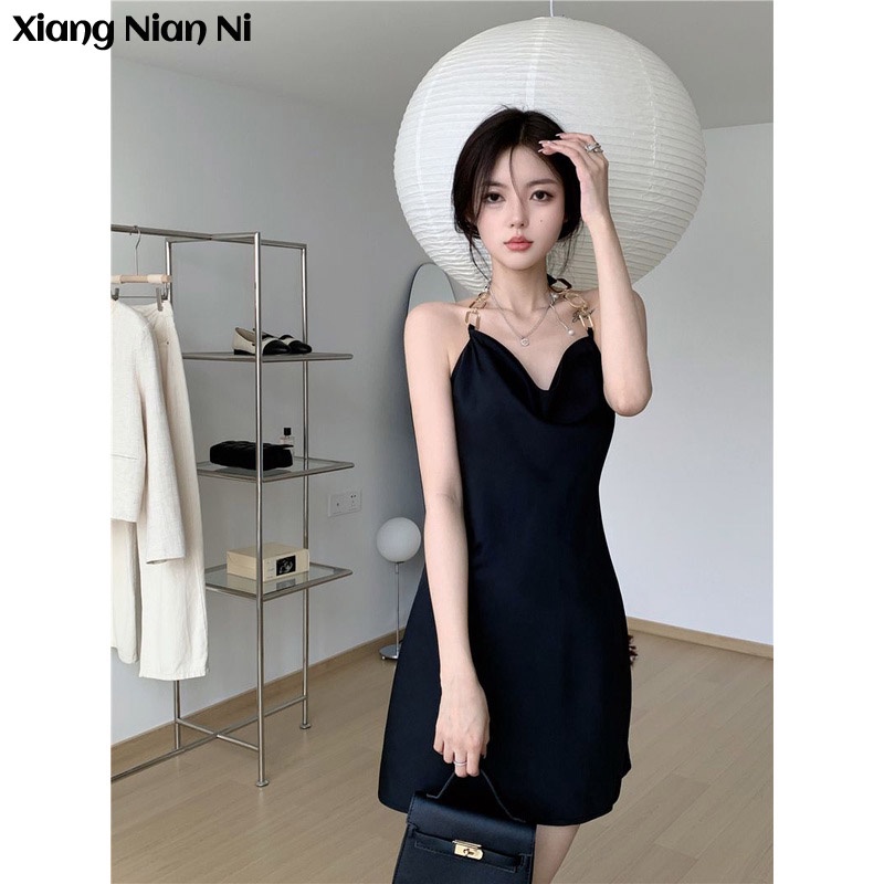 Đầm hai dây Xiang Nian Ni hở lưng phong cách Hàn Quốc quyến rũ