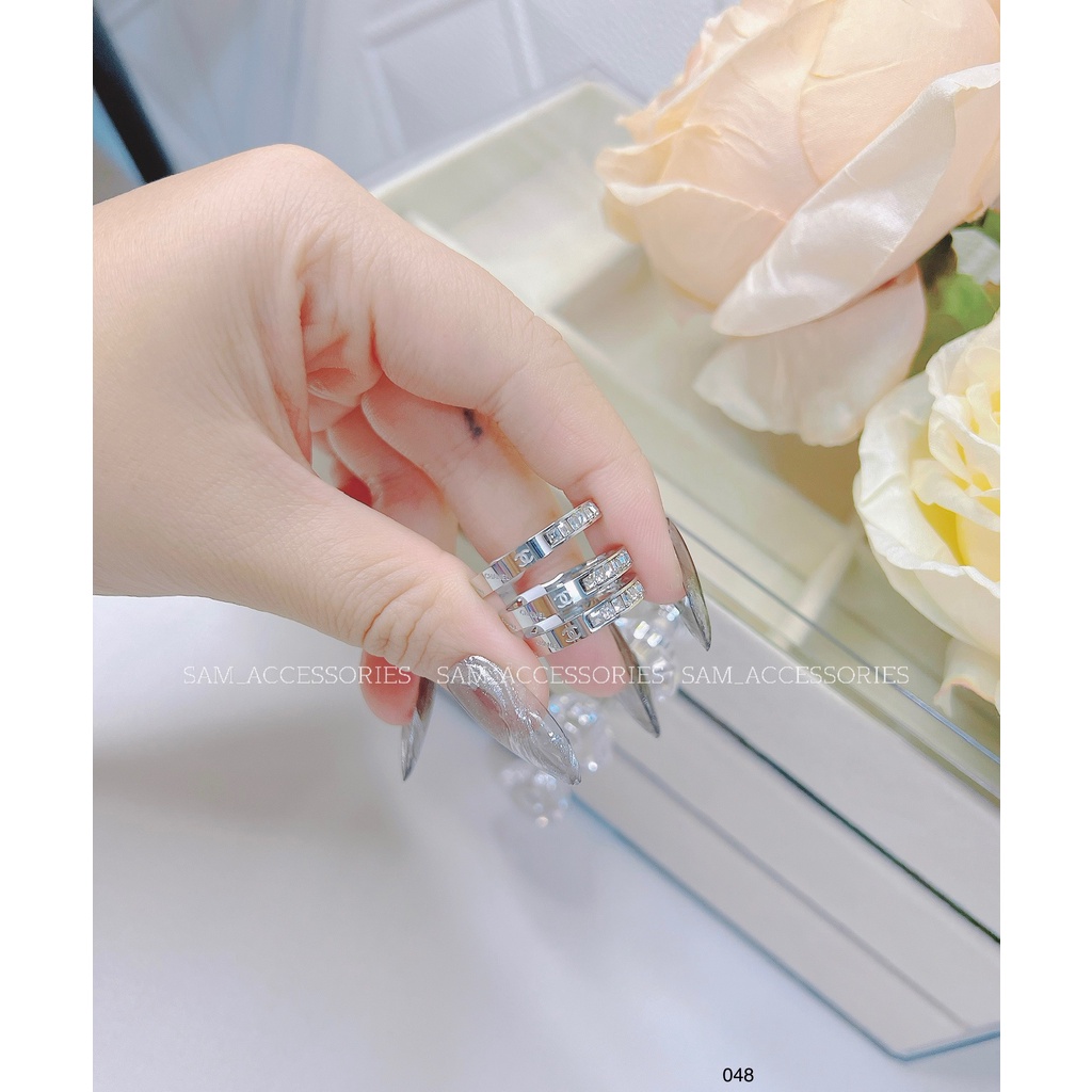 Nhẫn titan hiệu X nửa đá nửa chữ