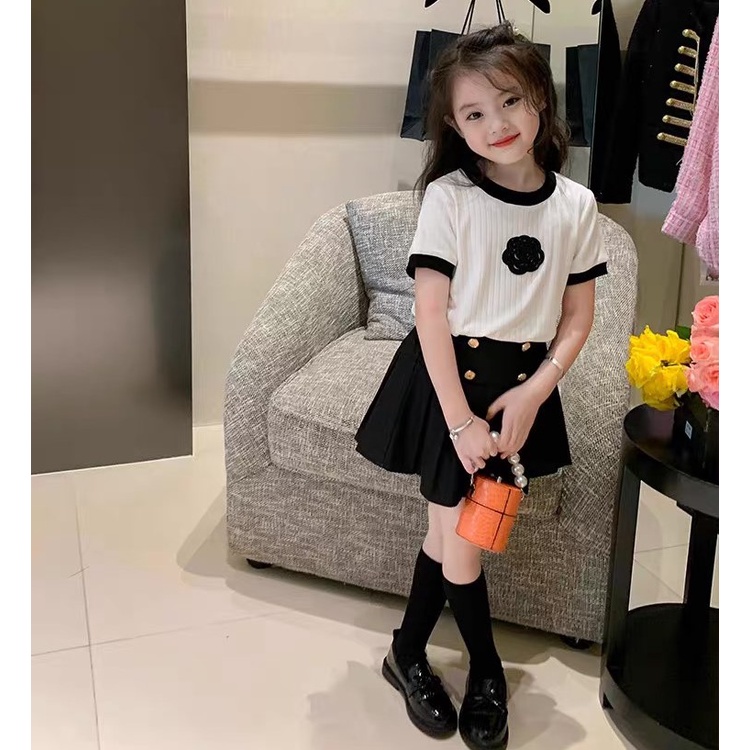 Set áo phối váy "HOA TRÀ" 18-48kg cho bé gái 4-14 tuổi. Chân váy xếp li xinh xắn. Hàng may kỹ. STA001