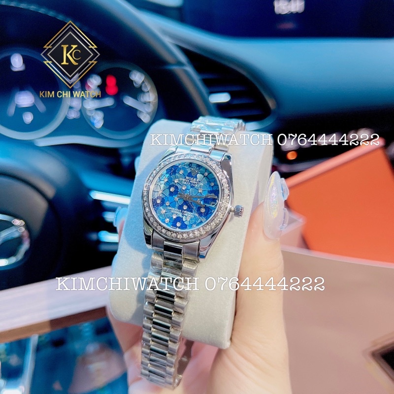 Đồng hồ rồ lếch nữ dây kim loại mặt hoa 3D ẩn đá xà cừ 2023 siêu hot