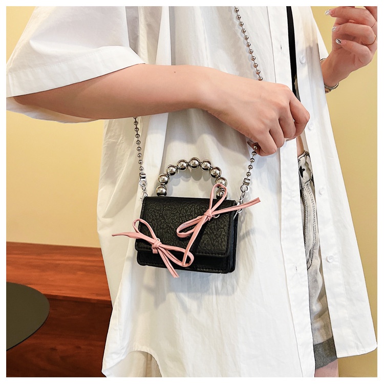 Túi mini nữ túi cầm tay phối nơ size nhỏ kèm dây xích dài đeo chéo tiểu thơ LK320 | BigBuy360 - bigbuy360.vn