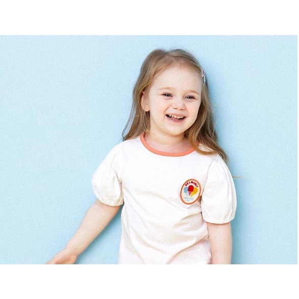 Áo cotton bé gái tay bồng tag ngực kem Hej. HA2889