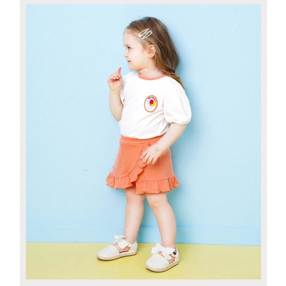 Áo cotton bé gái tay bồng tag ngực kem Hej. HA2889