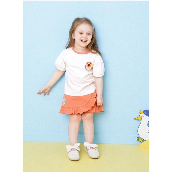 Áo cotton bé gái tay bồng tag ngực kem Hej. HA2889