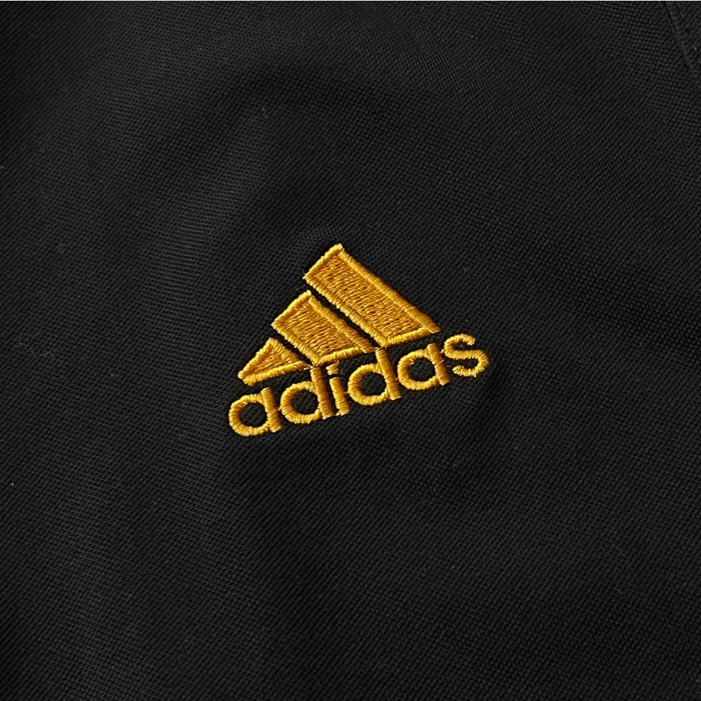 Áo Polo Das MU-VNXK-Đen logo vàng gold