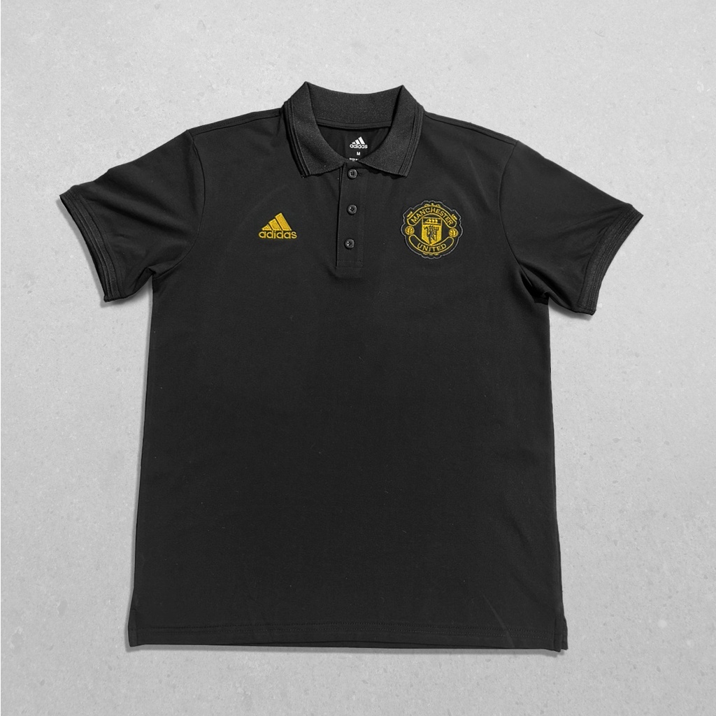 Áo Polo Das MU-VNXK-Đen logo vàng gold