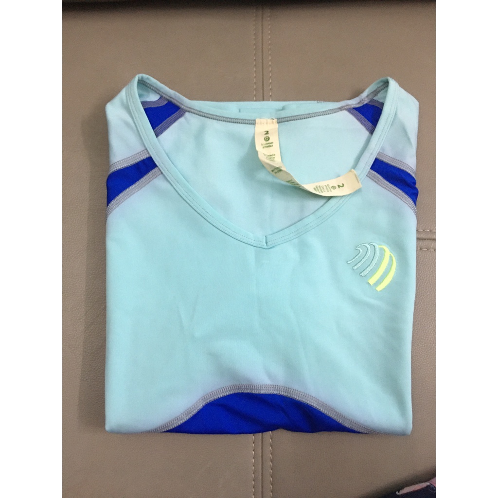 Áo thể thao nữ xuất dư size 2