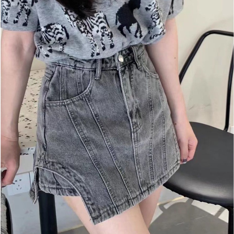 Quần váy ngắn denim mùa hè mới của phụ nữ eo cao túi ôm hông giả hai mảnh váy chữ A không đều