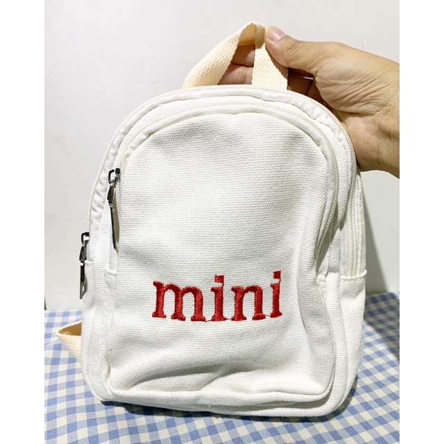 Balo mini trắng  vải canvas thêu chữ