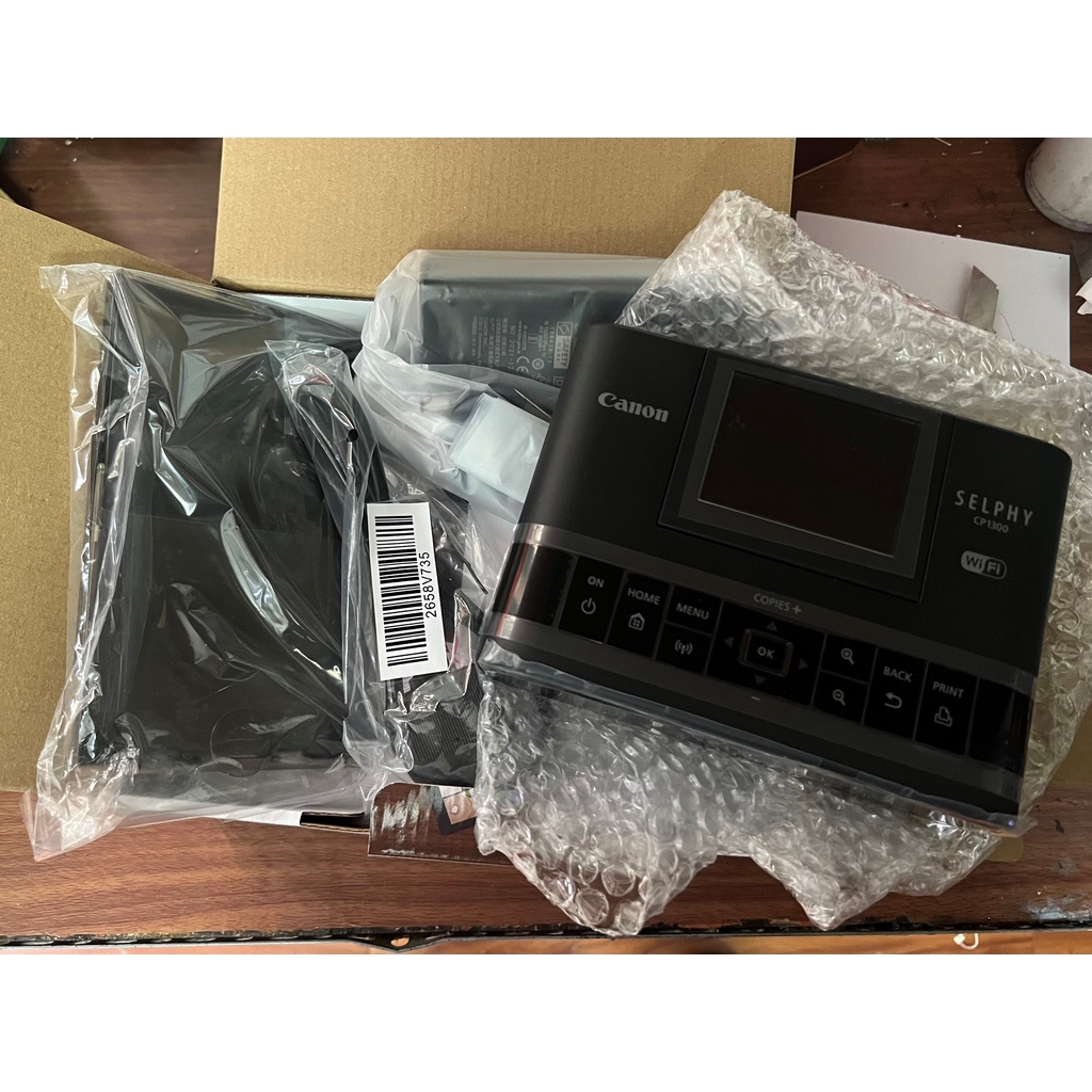 Máy in ảnh Canon Shelphy CP1300 có in Wifi