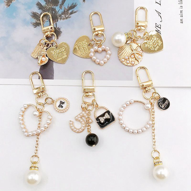 Phụ Kiện Ngọc Trai Mới Tự Làm Mặt Dây Chuyền / Túi Xách / Tai Nghe Điện Thoại Phong Cách Chanel Có 6 Lự