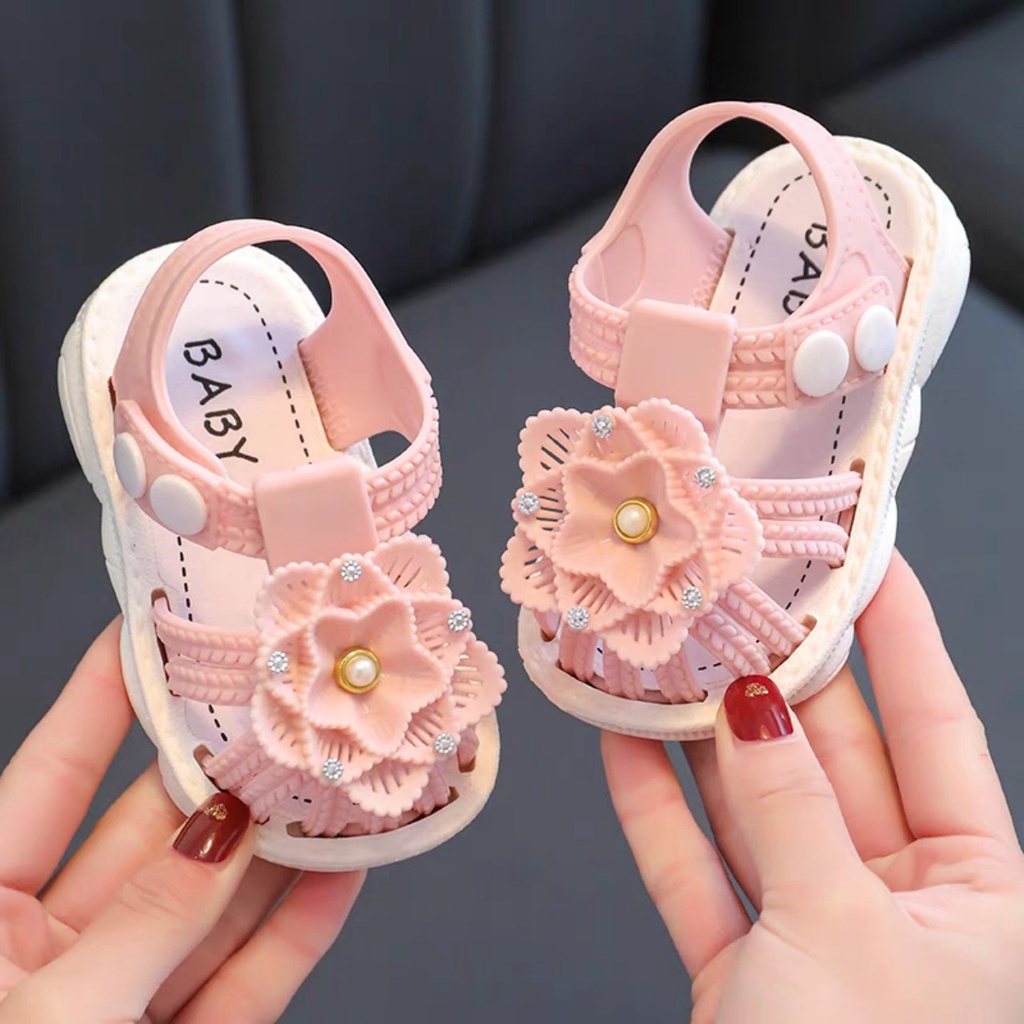 Sandal nút gài cho bé gái hình hoa mai chất liệu cao su