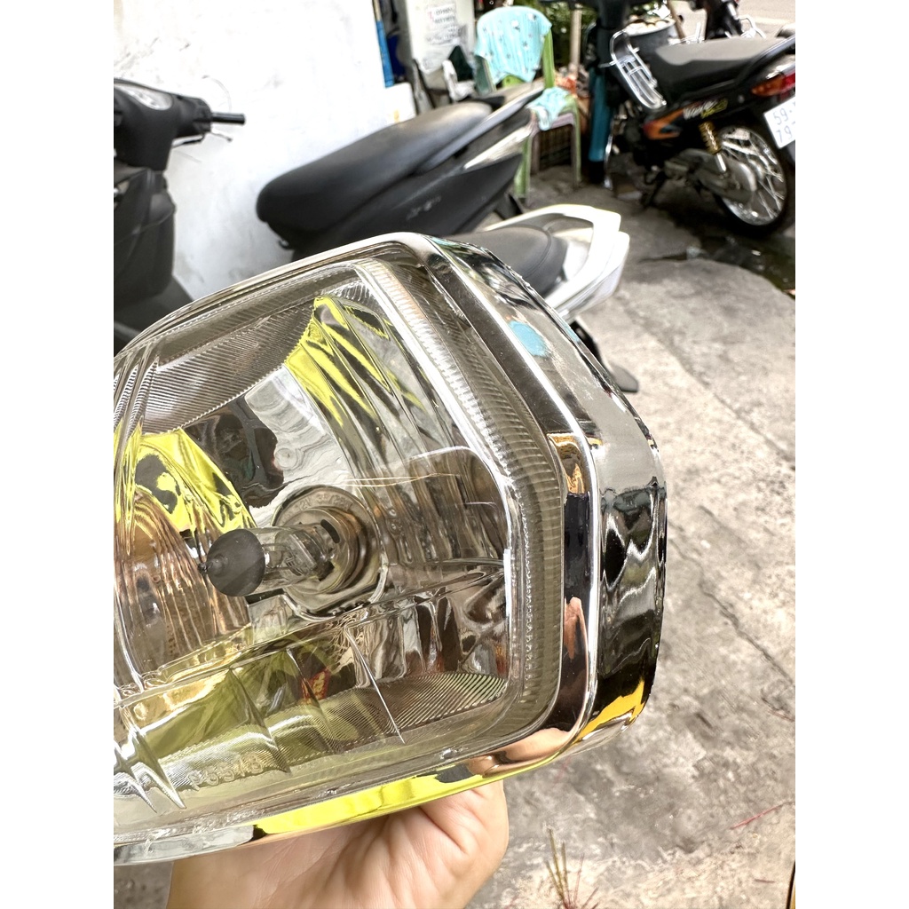 PHA ĐÈN TRƯỚC XE SUPPER DREAM LỒI