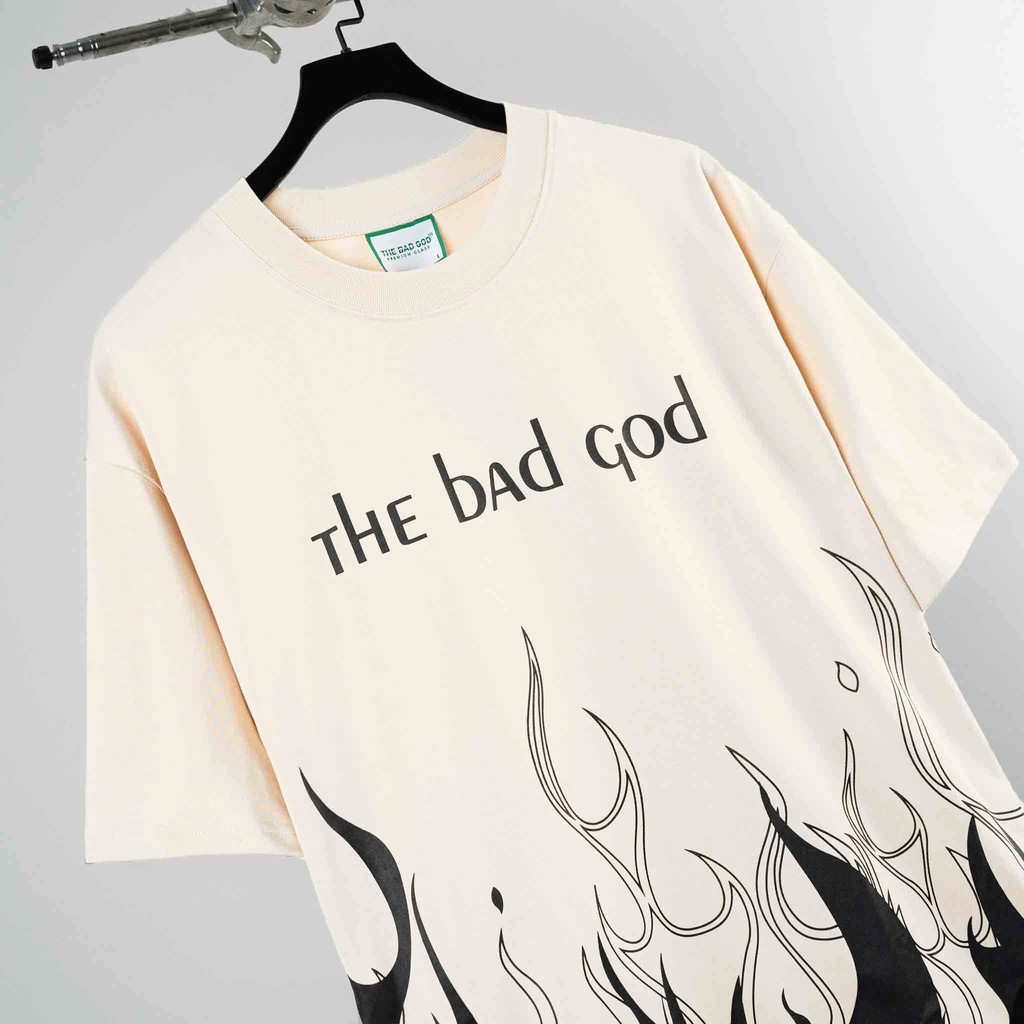 Áo thun tay lỡ The Bad God Beige Fire tee