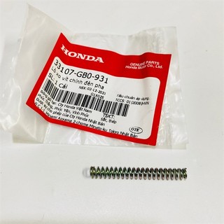 Lò xo vít chỉnh đèn pha dream 100 / cub -70 zin honda - 33107gb0931