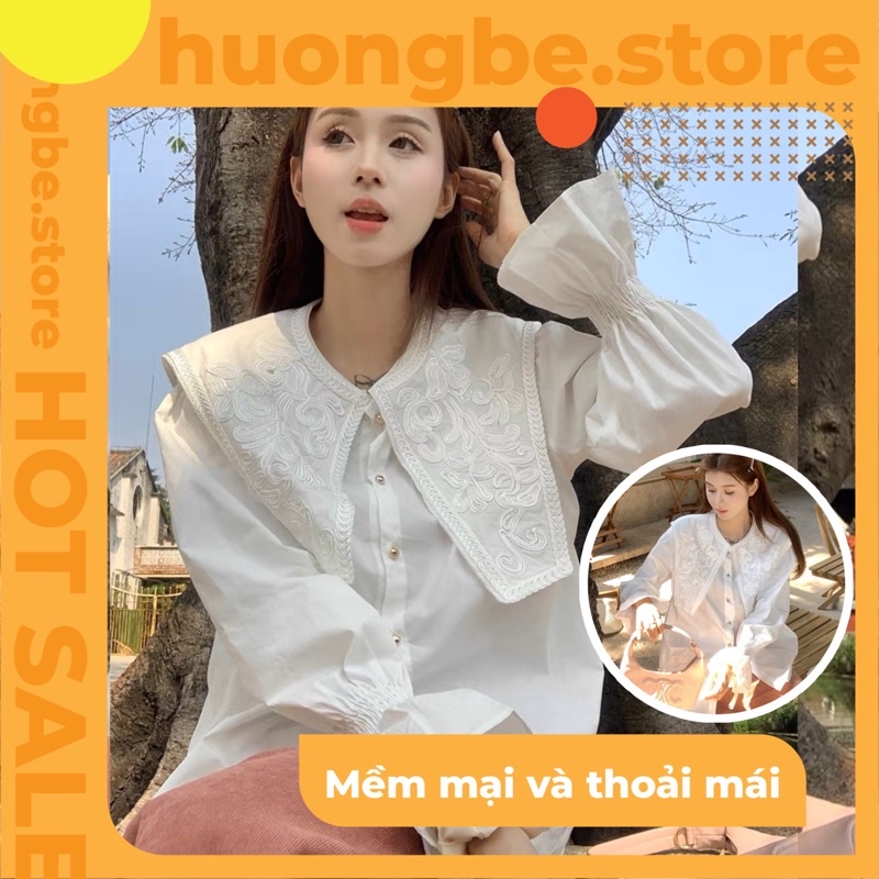 Áo sơ mi trắng, cách điệu tiểu thư, cổ vạt vuông đính nổi hoa văn cổ điển, dài tay bo chun