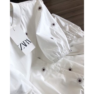 Đầm thô thêu xinh xắn