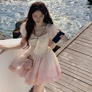 Váy xinh xoè tay bồng loang màu hồng cột nơ đi biển
