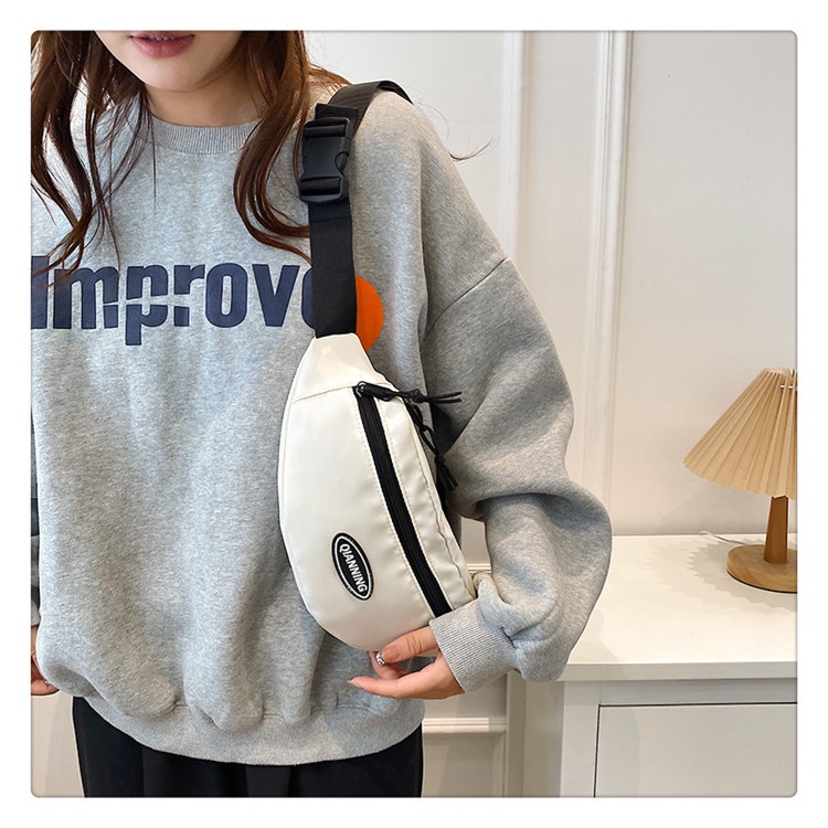 Túi đeo chéo nam nữ chất vải canvas trượt nước, đeo vai bao tử LOGO QIANNING, màu TRƠN | T2012|royalxuongmay