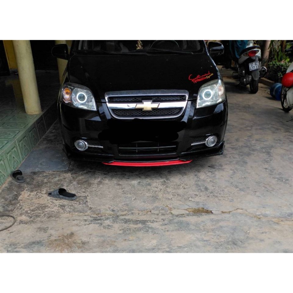 Lip po trước xe gentra - aveo