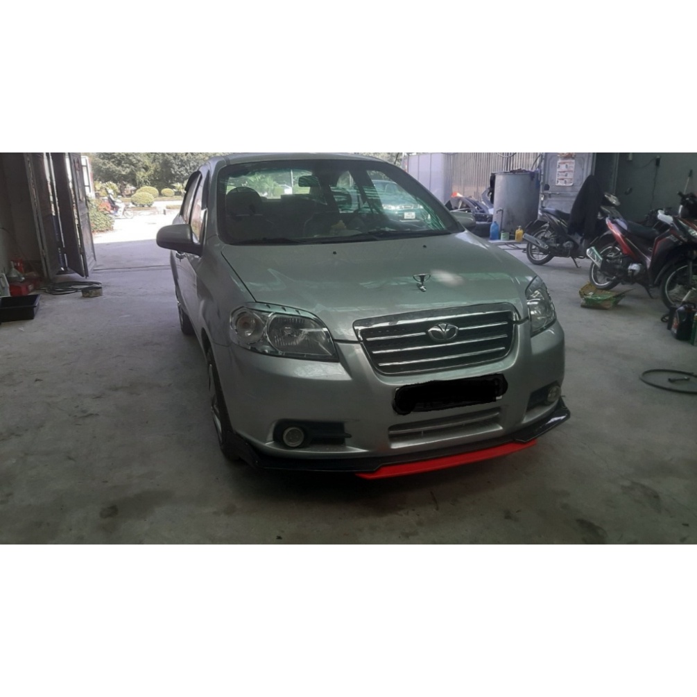 Lip po trước xe gentra - aveo