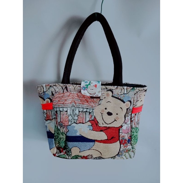 Túi làn khoá cúc dừa size 18*25cm