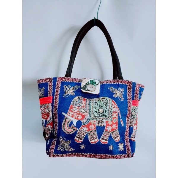 Túi làn khoá cúc dừa size 18*25cm